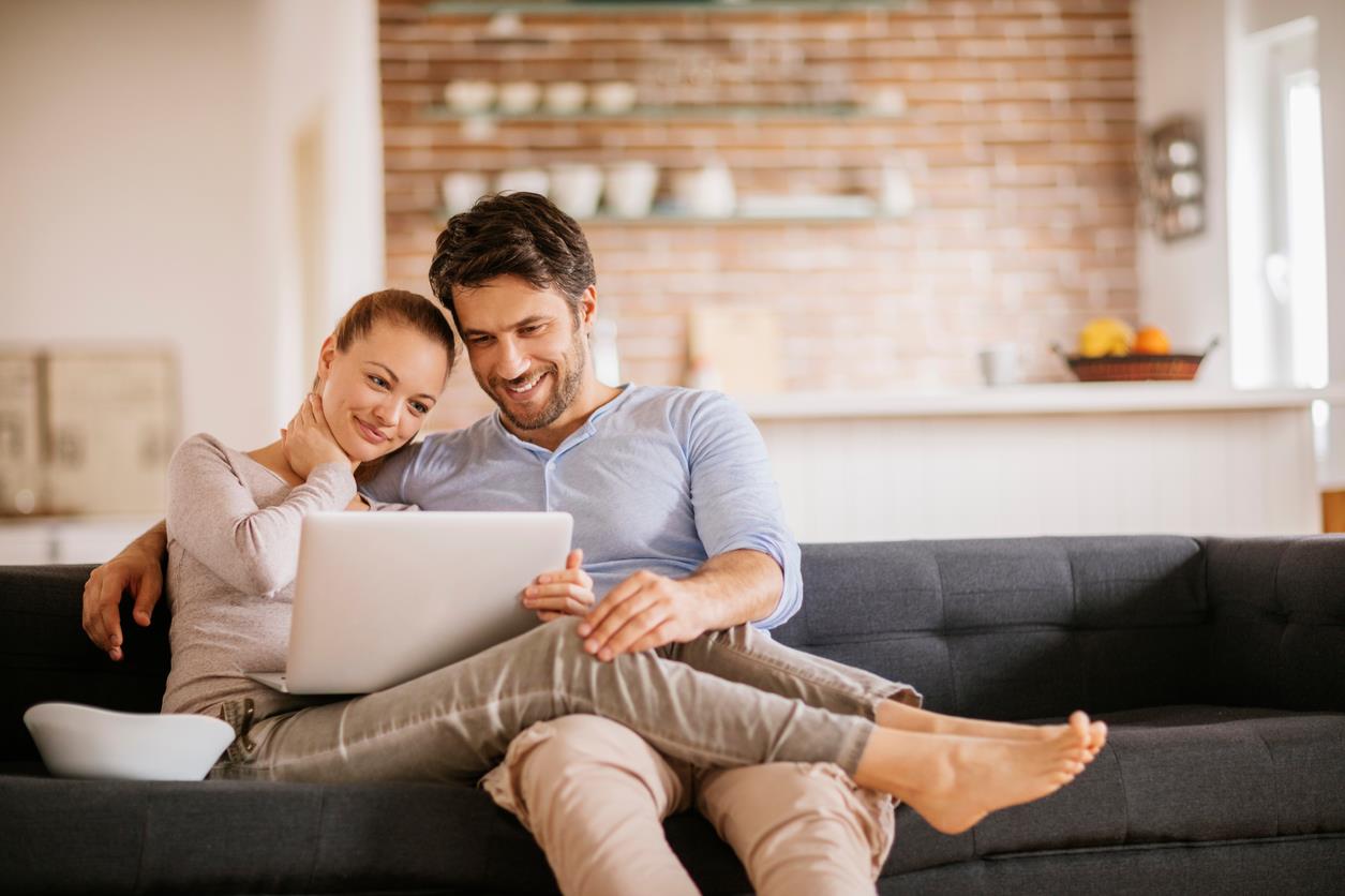 couple with computer